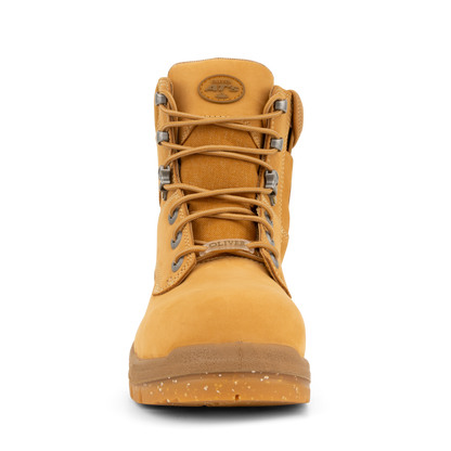 Yellow boot with laces on a white background