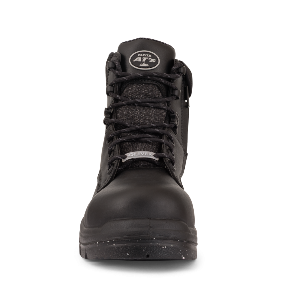 Black high-top boot with laces on a white background