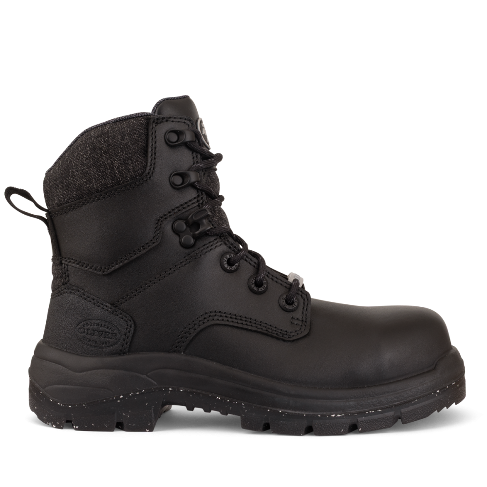Black boot with a rugged sole on a white background