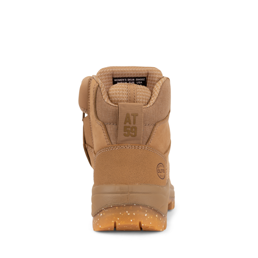 Tan boot with visible brand logo on a white background