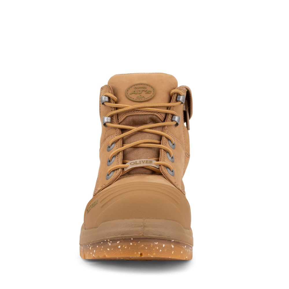 Tan boot with laces on a white background