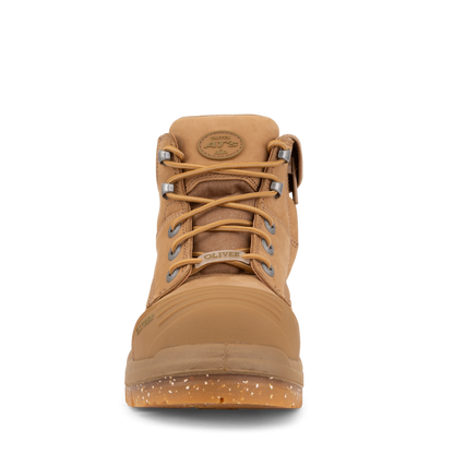 Tan boot with laces on a white background