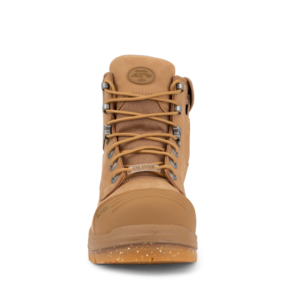 Tan hiking boot with laces on a white background