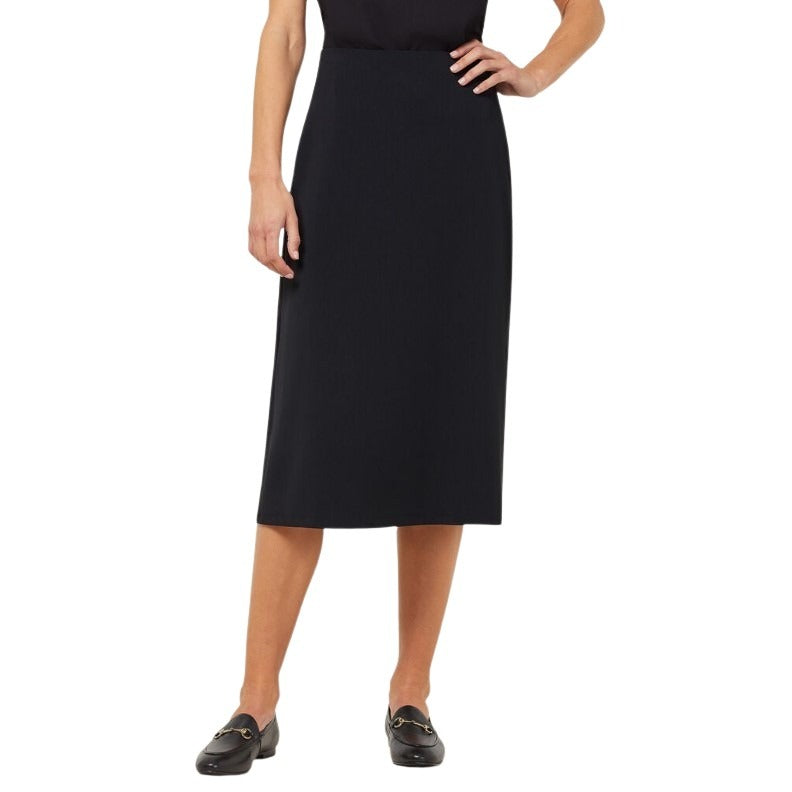 Person wearing a black knee-length skirt on a white background