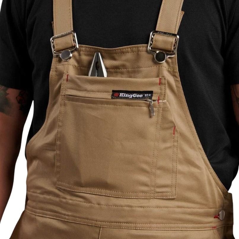 Brown King Gee apron with a pocket on a white background