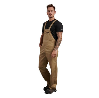 Man wearing brown bib overalls on a white background