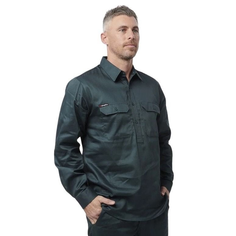 Man wearing a dark green shirt on a white background
