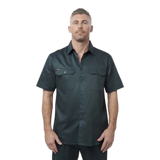Man wearing a dark green short-sleeve shirt on a white background