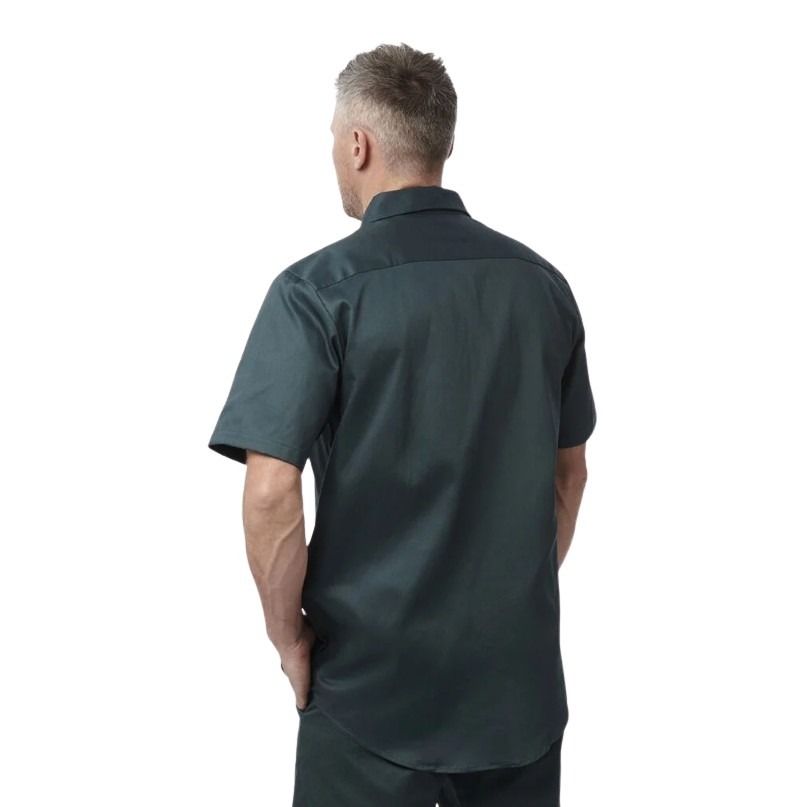 Man wearing a dark green shirt on a white background