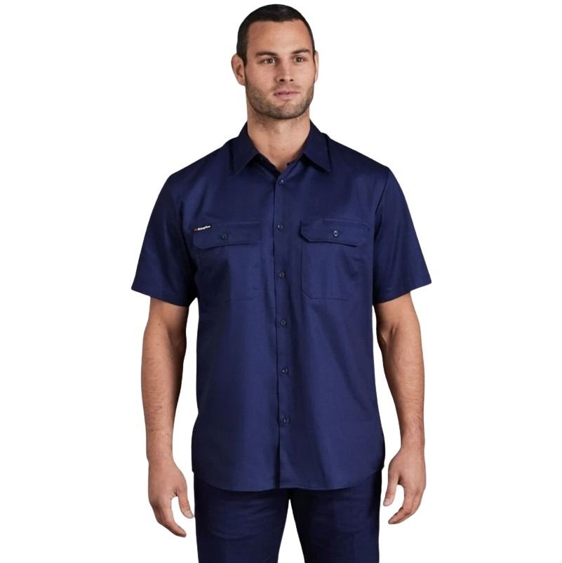 Man wearing a navy blue short-sleeve shirt on a white background