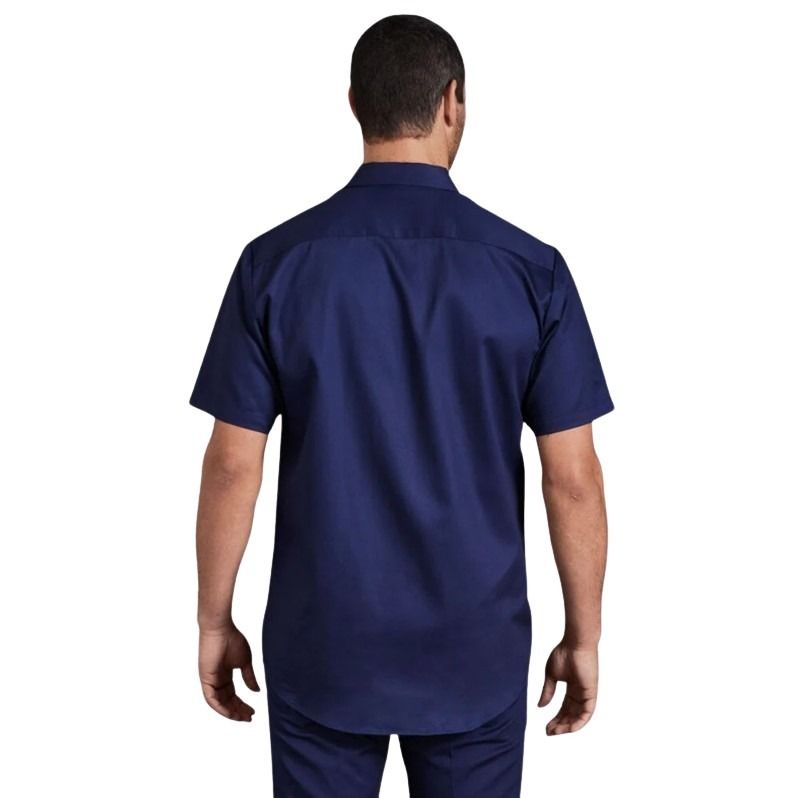 Man wearing a navy blue shirt on a white background