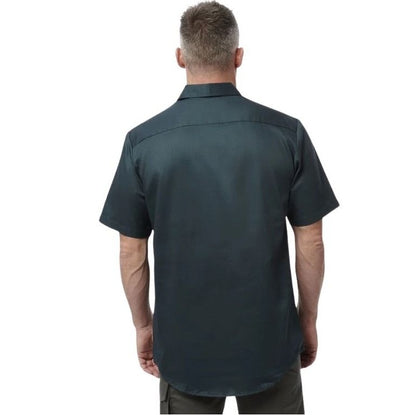 Man wearing a dark green short-sleeve shirt on a white background