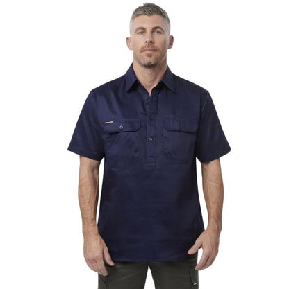 Man wearing a navy short-sleeve shirt on a white background