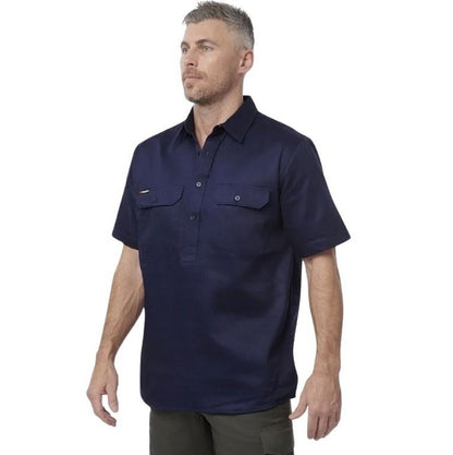 Man wearing a navy blue short-sleeve shirt on a white background