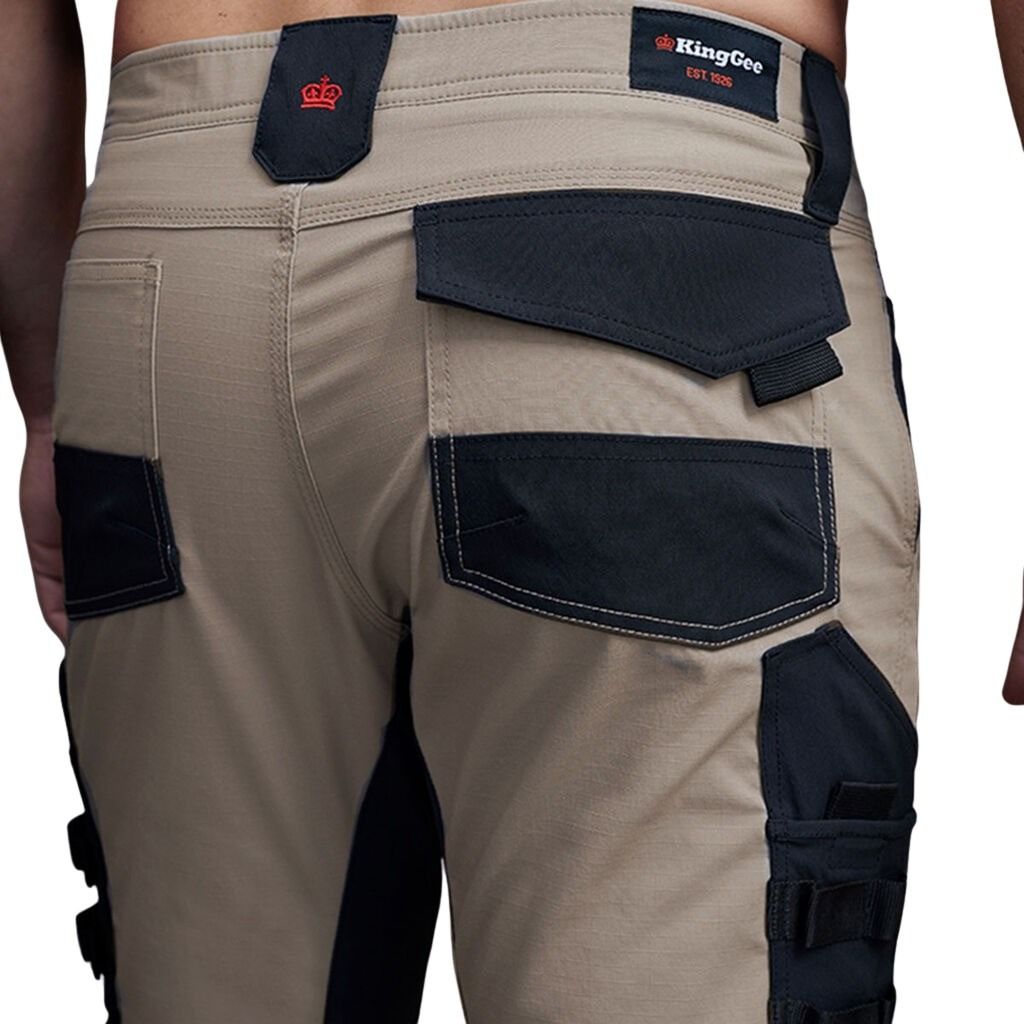 Beige work pants with black accents and Kinggee branding on a white background