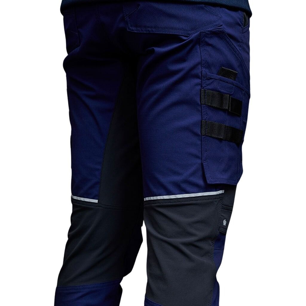 Navy blue work pants with black accents on a white background