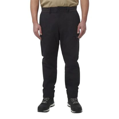 Person wearing black cargo pants on a white background