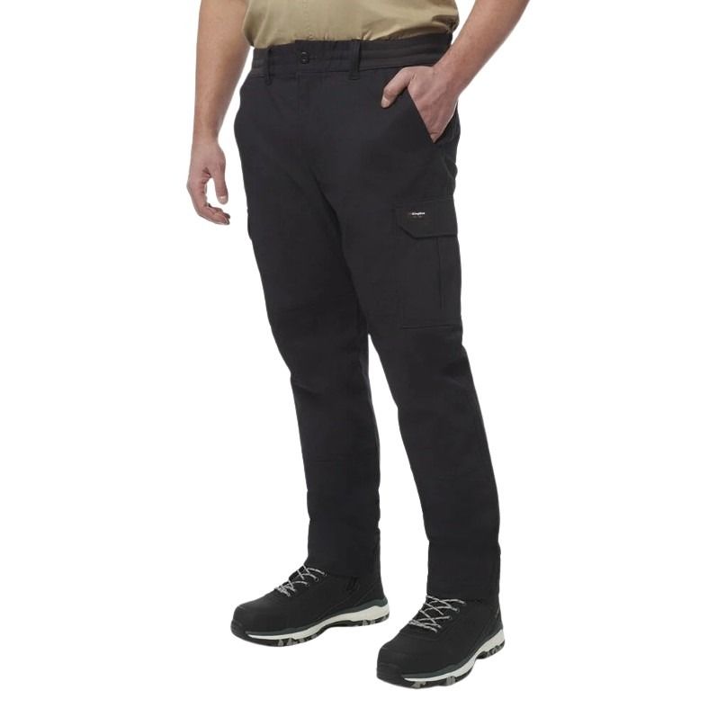 Person wearing black pants and black shoes on a white background