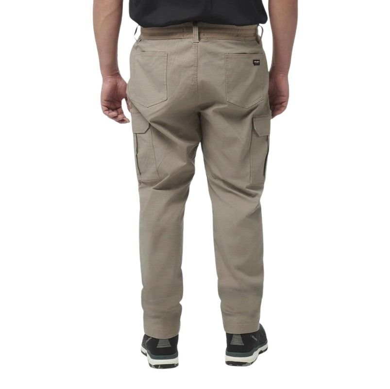 Beige cargo pants worn by a person on a white background