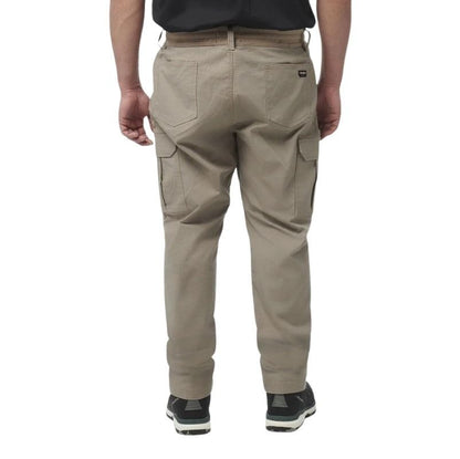 Beige cargo pants worn by a person on a white background
