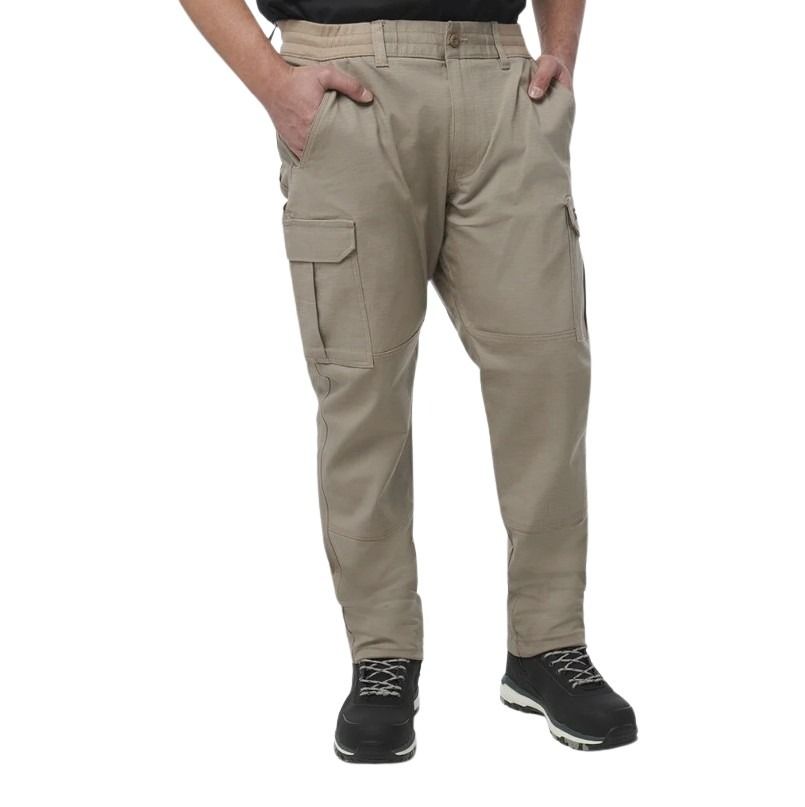 Beige cargo pants worn by a person on a white background