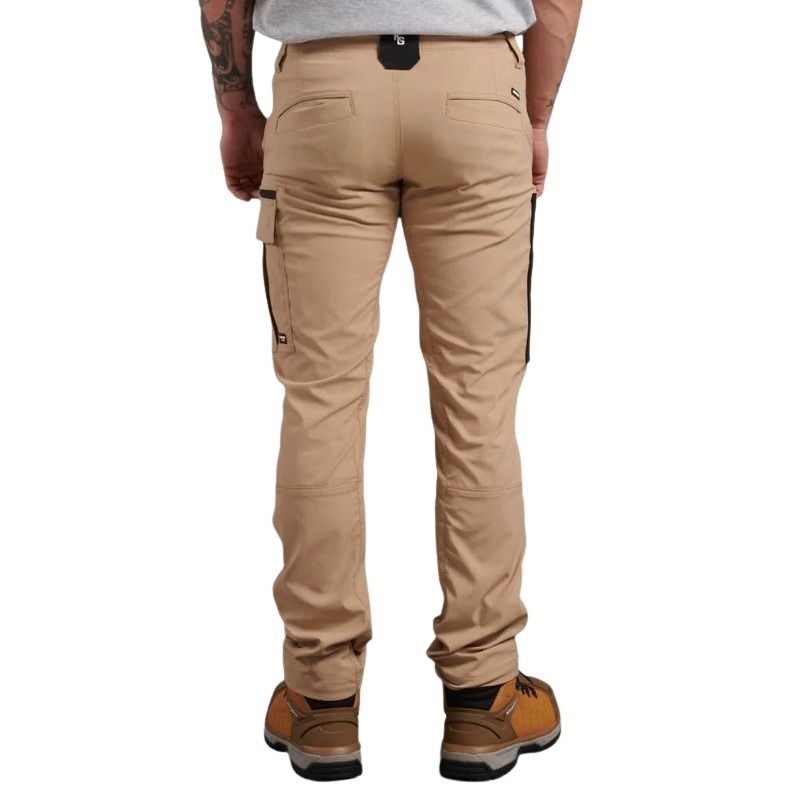 Beige cargo pants worn by a person on a white background