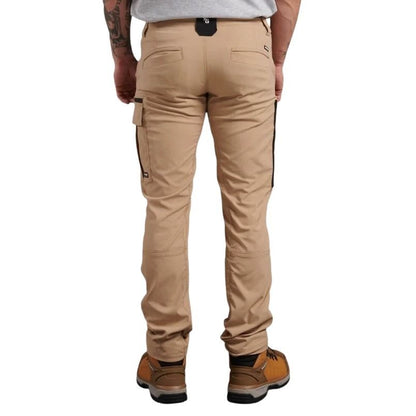 Beige cargo pants worn by a person on a white background