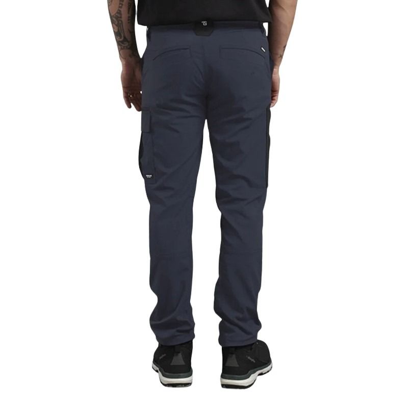 Person wearing dark blue cargo pants on a white background