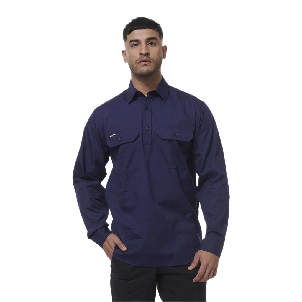 Man wearing a navy long-sleeve shirt on a white background
