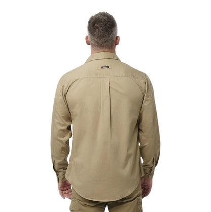 Man wearing a beige shirt on a white background