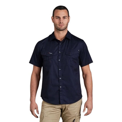 Man wearing a navy short-sleeve shirt on a white background