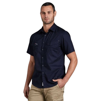 Man wearing a navy short-sleeve shirt on a white background