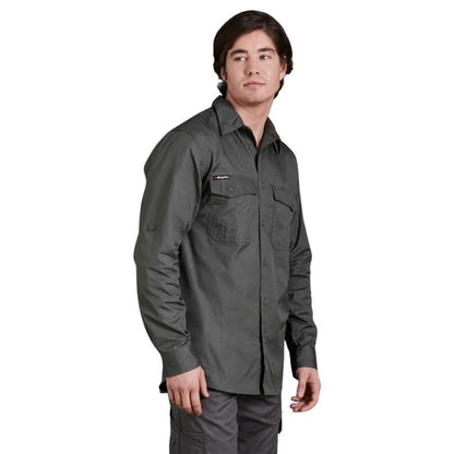 Man wearing a dark gray shirt with a visible brand logo on a white background