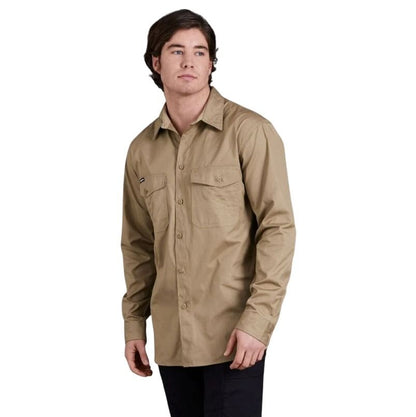 Man wearing a beige long-sleeve shirt on a white background