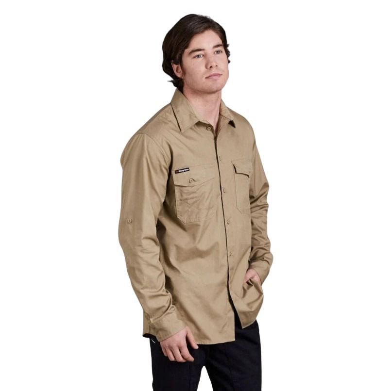 Man wearing a beige shirt on a white background