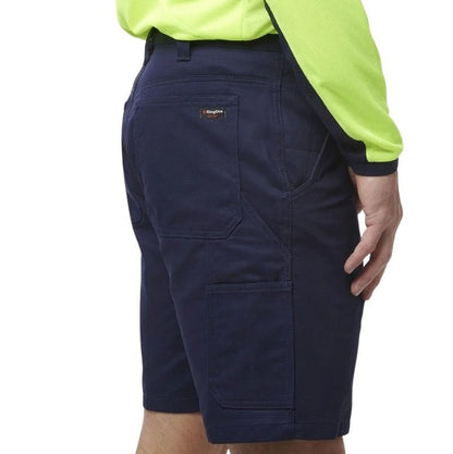 Navy shorts worn with a bright yellow shirt on a white background