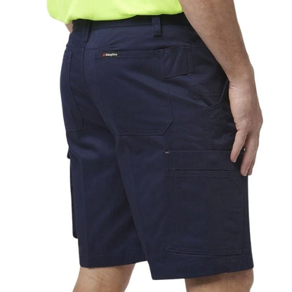 Navy cargo shorts worn by a person on a white background