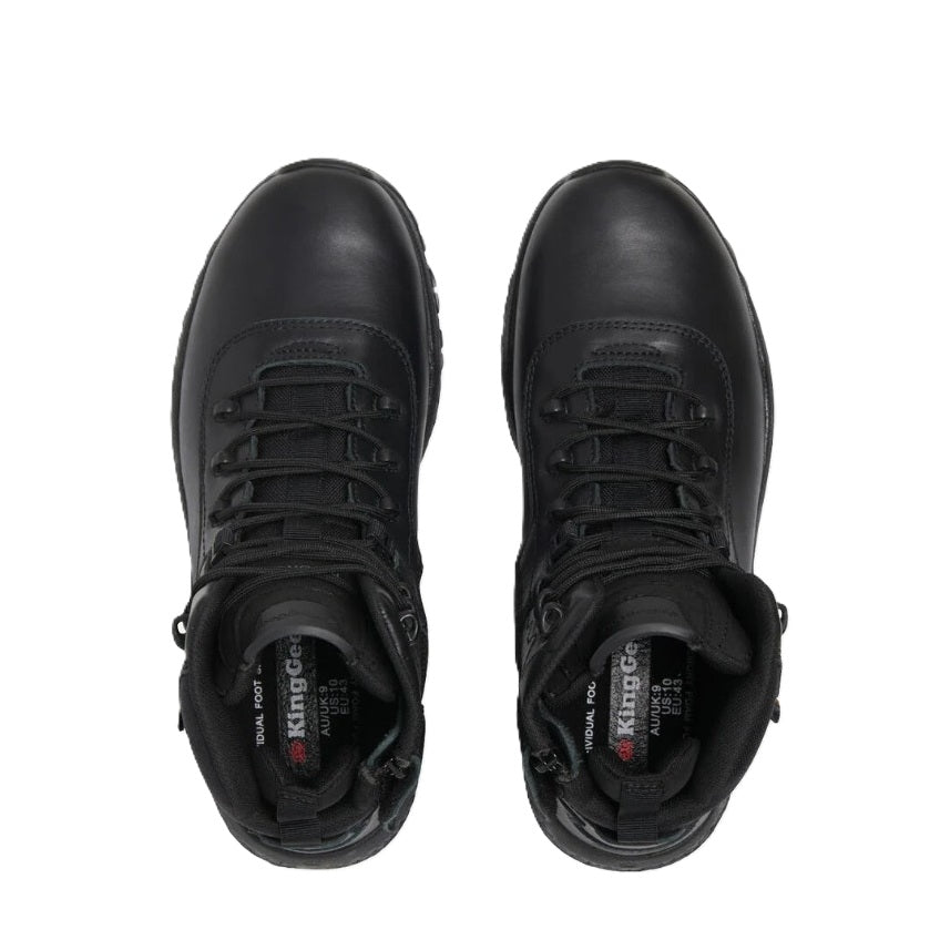 Pair of black high-top sneakers on a white background