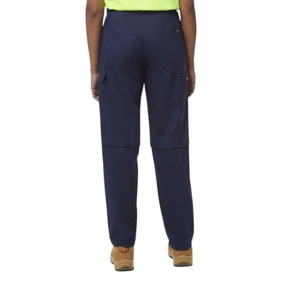 Navy blue pants worn by a person on a white background