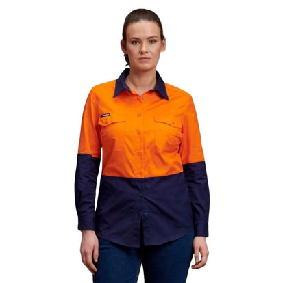 Person wearing a two-tone orange and navy work shirt on a white background
