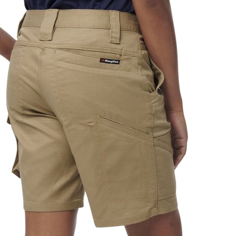 Beige shorts with a brand label on a white background