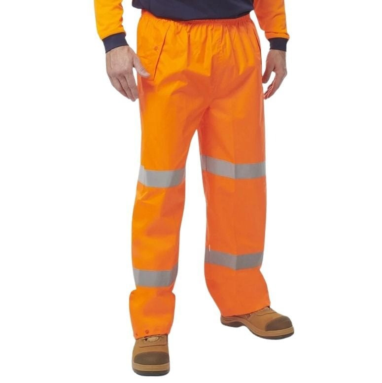 Orange high-visibility work pants with reflective stripes on a white background