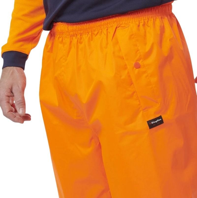 Orange pants with a brand logo on a white background