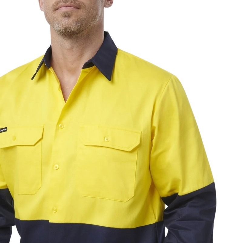 yellow and navy spliced shirt on white background with two pockets