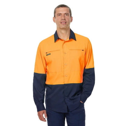 Man wearing a two-tone orange and navy work shirt on a white background