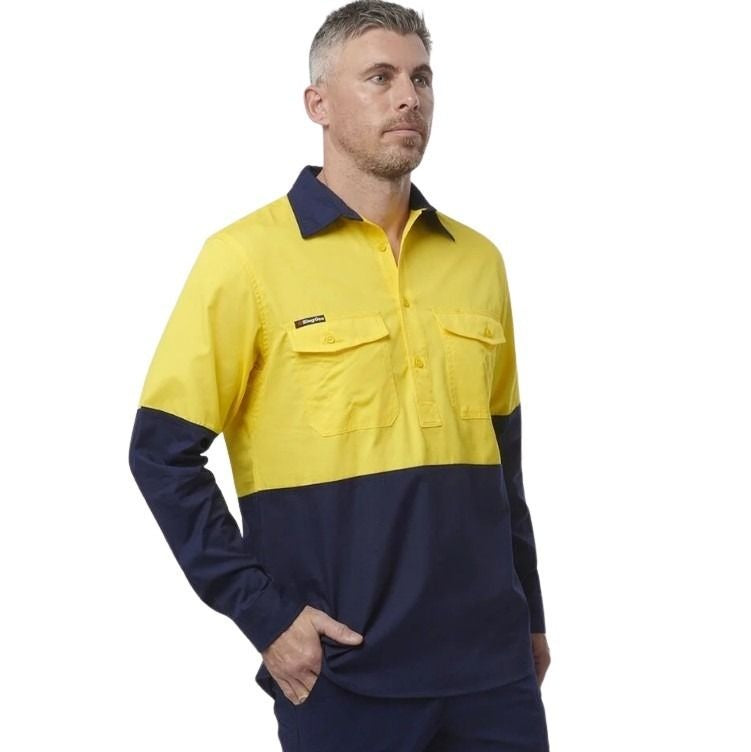 Spliced yellow and navy shirt on a white background