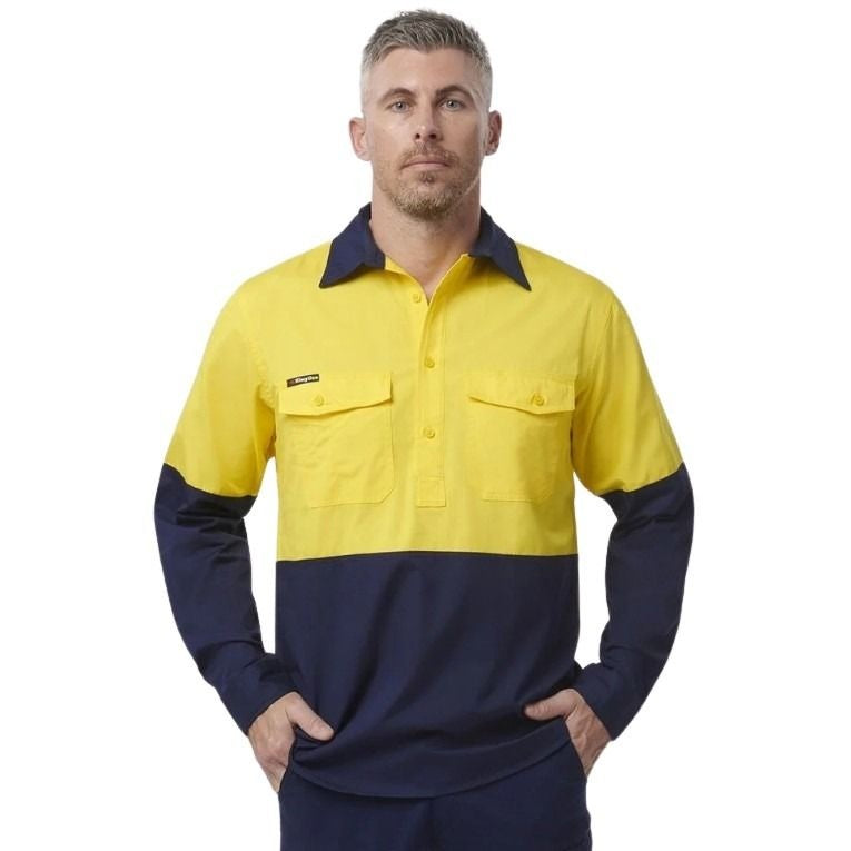 Spliced yellow and navy shirt on a white background
