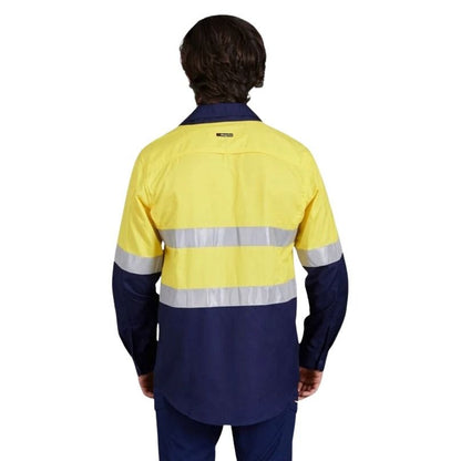 Person wearing a high-visibility yellow and navy work shirt on a white background