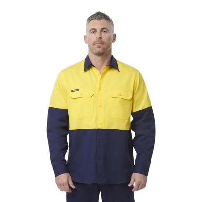 Man wearing a yellow and navy work shirt on a white background