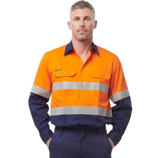 Man wearing orange navy workshirt with reflective tape on white background